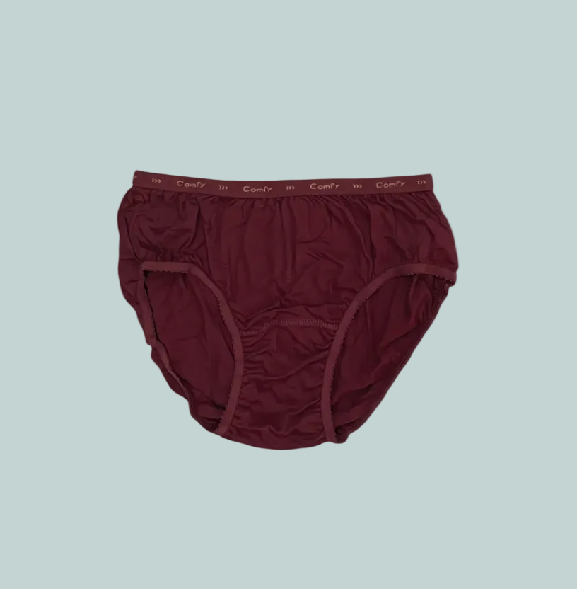 Five pairs of colorful panties on a white surface with 'Comfy Panties' branding.