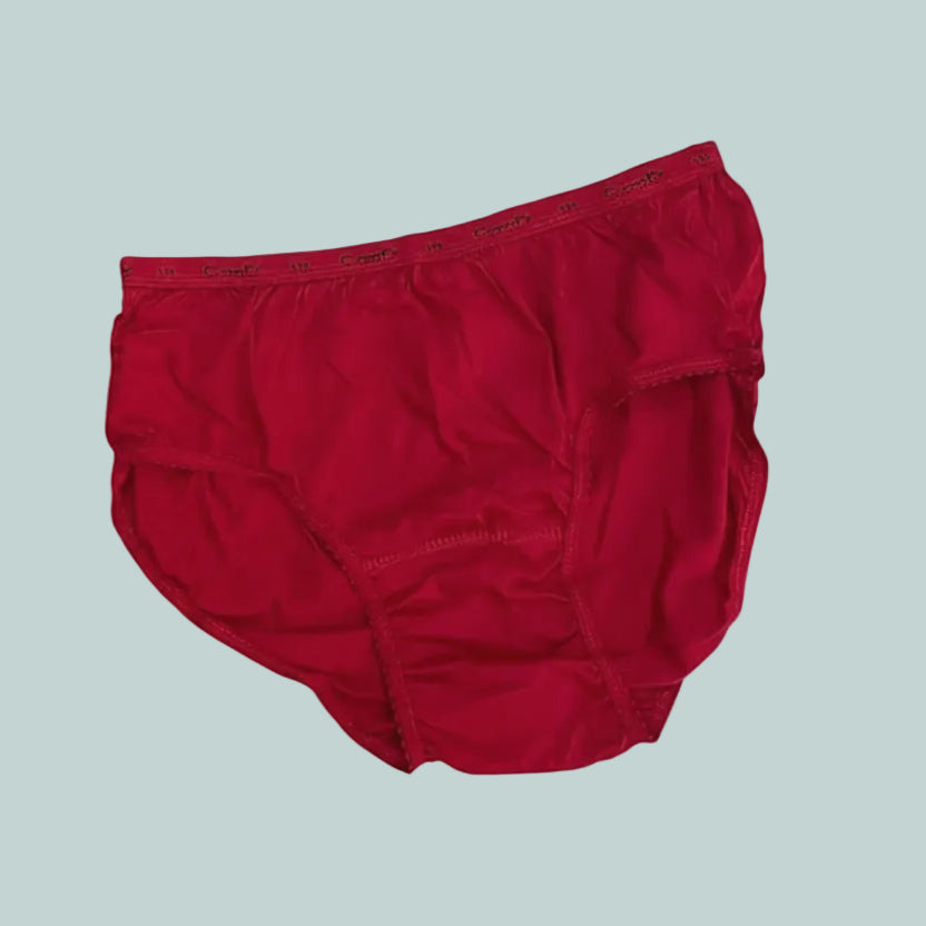 Five pairs of colorful panties on a white surface with 'Comfy Panties' branding.