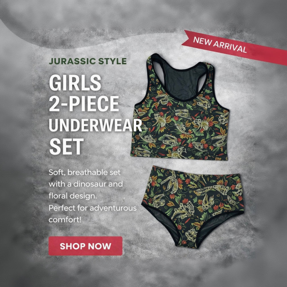 Girls 2-piece underwear set with dinosaur and floral design on a textured gray background.